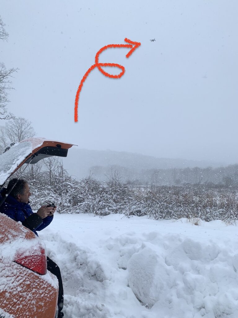 Flying Drone from Back of the Car